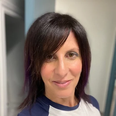 Cindy smiling at camera